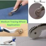Close-up of the toothed roller on a pattern tracing wheel